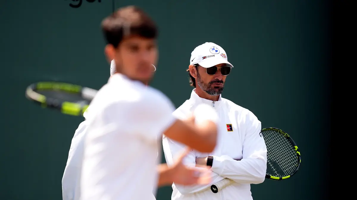 Wimbledon-2025-Day-Nine-All-England-Lawn-Tennis-and-Croquet-Club-Coach-of-Carlos-Alcaraz-Juan-Carlos-Ferrero-right-on-day-nine-of-the-2025-Wimbledon-Championships-at-the-All-England-Lawn-Tennis-and-Croquet-Club-London-Picture-date-Tuesday-July-8-2025-Photo-credit-should-read-Mike-Egerton-PA-Wire-RESTRICTIONS-Editorial-use-only-No-commercial-use-without-prior-written-consent-of-the-AELTC-Still-image-use-only-no-moving-images-to-emulate-broadcast-No-superimposing-or-removal-of-sponsor-ad-logos