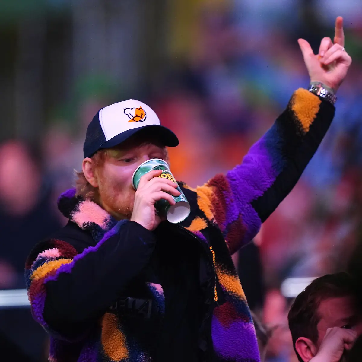 2024-25-Paddy-Power-World-Darts-Championship-Alexandra-Palace-Day-Six-EDITOR-NOTE-Gesture-Singer-songwriter-Ed-Sheeran-reacts-to-the-crowd-chanting-about-Ipswich-Town-during-day-six-of-the-Paddy-Power-World-Darts-Championship-at-Alexandra-Palace-London-Picture-date-Friday-December-20-2024-See-PA-story-DARTS-World-Photo-credit-should-read-Zac-Goodwin-PA-Wire-RESTRICTIONS-Use-subject-to-restrictions-Editorial-use-only-no-commercial-use-without-prior-consent-from-rights-holder