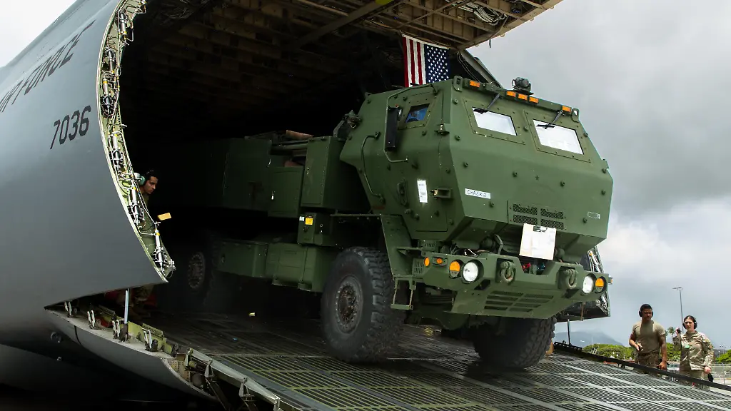 July-16-2025-Hawaii-USA-U-S-Air-Force-Airmen-and-U-S-Army-Soldiers-unload-a-High-Mobility-Artillery-Rocket-System-HIMARS-launcher-from-a-U-S-Air-Force-C-5-Galaxy-at-Joint-Base-Pearl-Harbor-Hickam-July-16-2025-This-transformation-enhances-the-division-s-Long-Range-Precision-Fires-capability-strengthening-its-lethality-and-warfighting-readiness-to-ensure-a-Free-and-Open-Indo-Pacific-Credit-Image-U-S