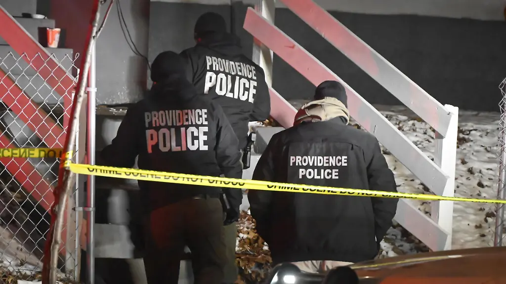 PROVIDENCE-RI-UNITED-STATES-DECEMBER-15-Providence-Police-work-the-scene-of-a-shooting-in-the-area-of-Eddy-Street-and-Sayles-Street-in-Providence-Rhode-Island-United-States-December-15-2025-After-10-30-PM-Monday-evening-a-shooting-transpired-prompting-a-major-police-response-to-the-area-Blood-was-seen-on-steps-of-a-building-as-police-tape-cordoned-off-the-area-and-authorities-blocked-the-street