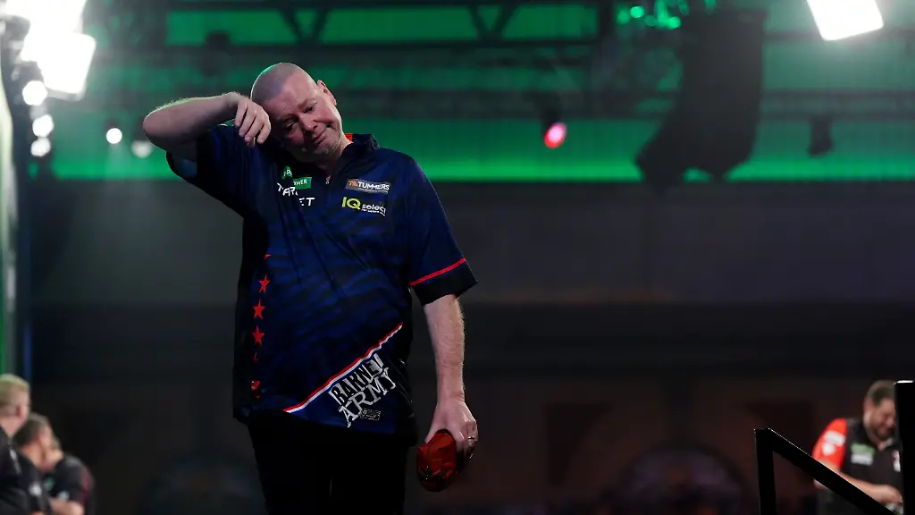 Paddy-Power-World-Darts-Championship-Day-Seven-Alexandra-Palace-Raymond-van-Barneveld-reacts-as-he-leaves-the-stage-after-losing-his-match-against-Stefan-Bellmont-on-day-seven-of-the-Paddy-Power-World-Darts-Championship-at-the-Alexandra-Palace-London-Picture-date-Wednesday-December-17-2025-See-PA-story-DARTS-World-Photo-credit-should-read-Bradley-Collyer-PA-Wire-RESTRICTIONS-Use-subject-to-restrictions-Editorial-use-only-no-commercial-use-without-prior-consent-from-rights-holder