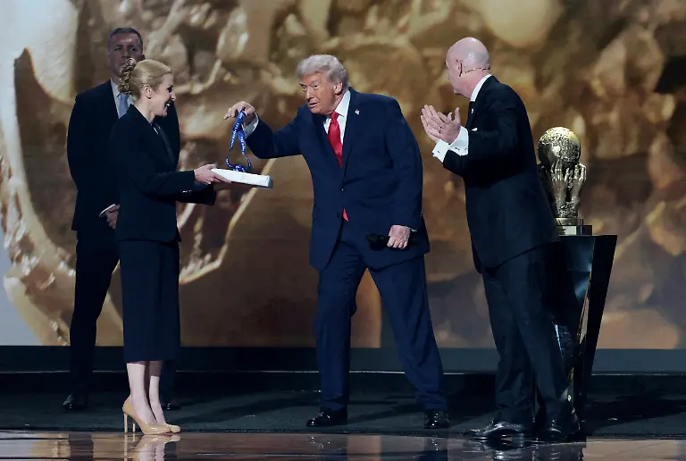 U-S-President-Donald-Trump-is-awarded-the-inaugural-FIFA-Peace-Prize-by-FIFA-President-Gianni-Infantino-during-the-FIFA-World-Cup-2026-Draw-at-the-John-F-Kennedy-Center-for-the-Performing-Arts-in-Washington