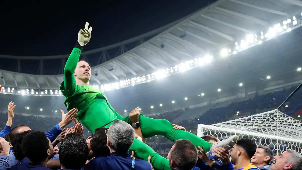 Matvey-Safonov-goalkeeper-of-PSG-and-Russia-celebrate-after-winning-FIFA-Intercontinental-Cup-2025-Final-match-between-Paris-Saint-Germain-FC-and-Flamengo-at-Ahmad-Bin-Ali-Stadium-on-December-17-2025-in-Doha-Qatar