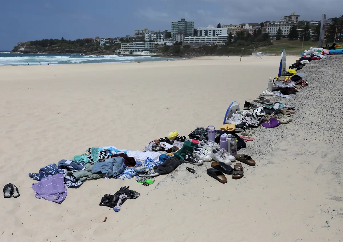 Belongings-left-behind-by-people-are-gathered-at-the-beach-near-the-scene-of-a-shooting-on-a-Jewish-holiday-celebration-at-Bondi-Beach-in-Sydney-Australia-December-15