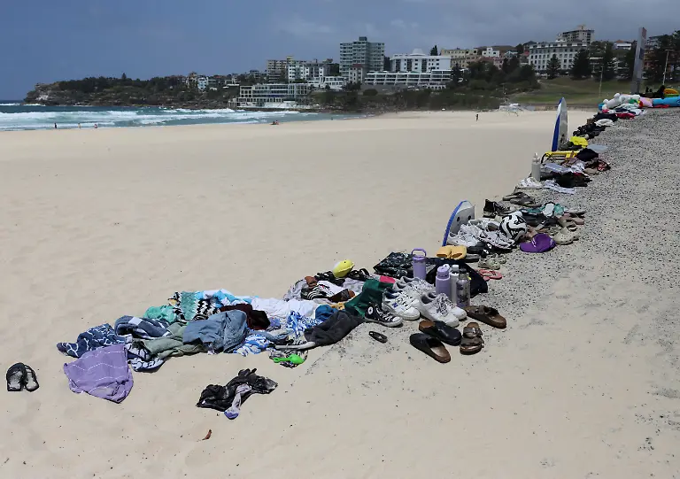 Belongings-left-behind-by-people-are-gathered-at-the-beach-near-the-scene-of-a-shooting-on-a-Jewish-holiday-celebration-at-Bondi-Beach-in-Sydney-Australia-December-15