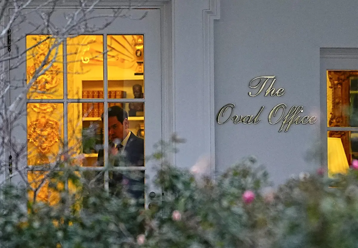 U-S-Secretary-of-State-Marco-Rubio-stands-at-the-Oval-Office-as-U-S-President-Donald-Trump-not-pictured-returns-to-the-White-House-from-Dover-Air-Force-Base-in-Washington-D-C-U-S-December-17-2025