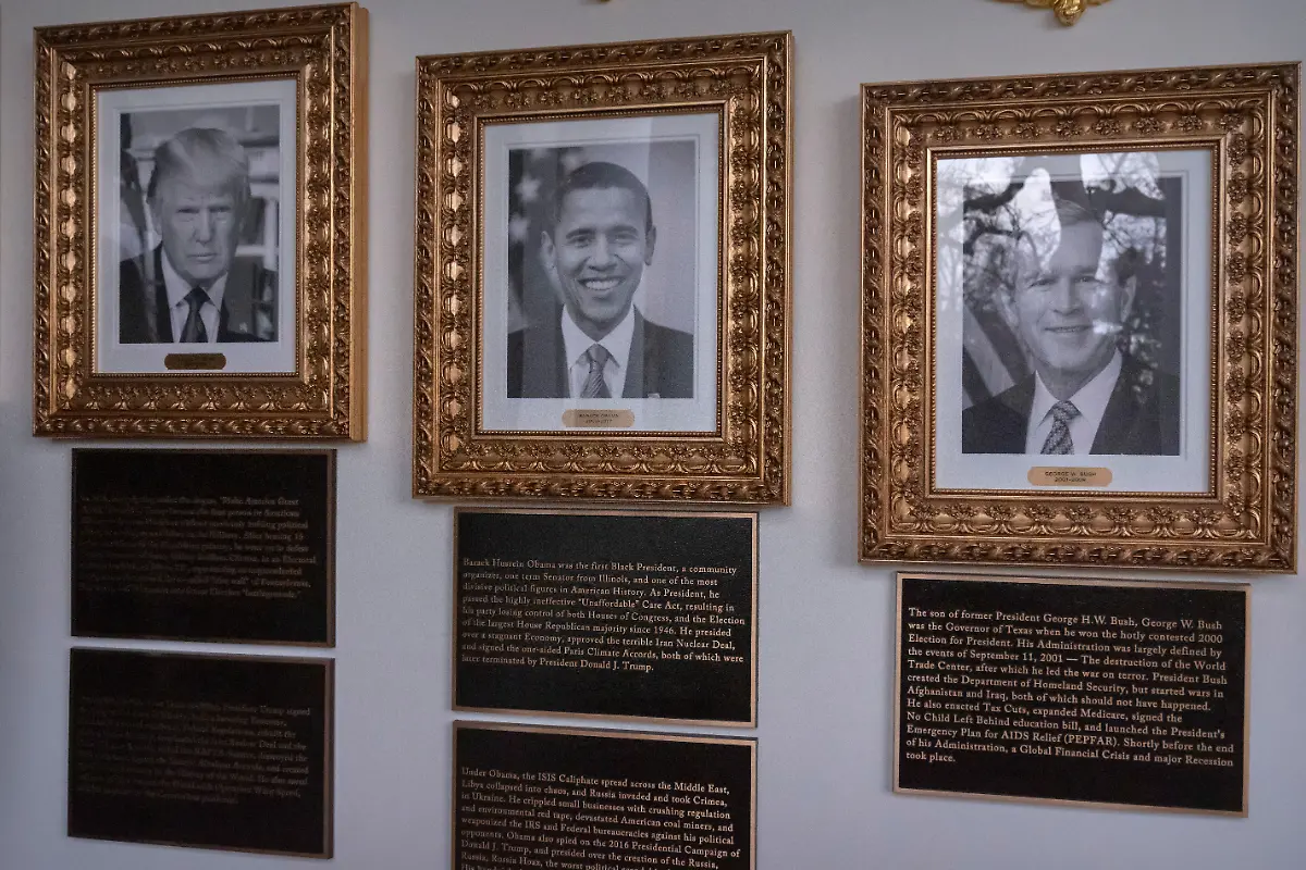 Portraits-of-President-Donald-Trump-and-former-Presidents-Barack-Obama-and-George-W-Bush-with-plaques-of-text-below-are-seen-on-the-Presidential-Walk-of-Fame-on-the-Colonnade-of-the-White-House-Wednesday-Dec-17-2025-in-Washington