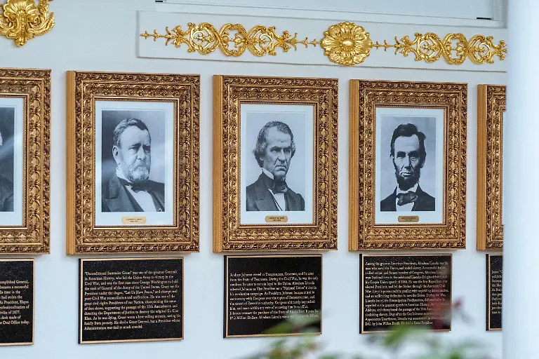 New-plaques-of-explanatory-text-have-been-placed-underneath-presidential-portraits-on-the-Colonnade-at-the-White-House-Wednesday-Dec-17-2025-in-Washington