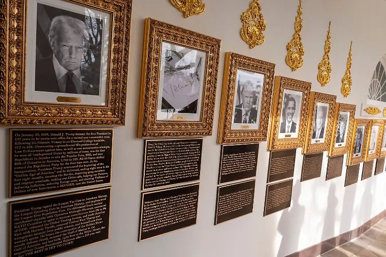 New-plaques-of-explanatory-text-have-been-placed-underneath-presidential-portraits-on-the-Colonnade-at-the-White-House-Wednesday-Dec-17-2025-in-Washington