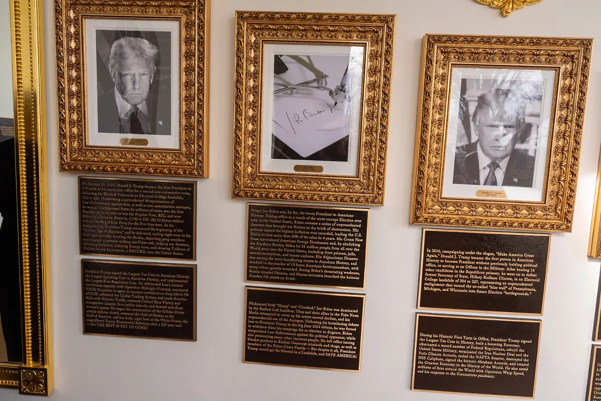 New-plaques-have-been-placed-underneath-presidential-portraits-on-the-Colonnade-at-the-White-House-Wednesday-Dec-17-2025-in-Washington