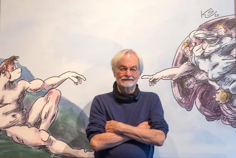 FRANKFURT-MAIN-DEUTSCHLAND-29-Maerz-2022-Klaus-Stuttmann-einer-der-renommiertesten-tagespolitischen-Karikaturisten-steht-in-der-Ausstellung-Statements-vor-Zeichnunge-zu-den-Corona-Abstandsregeln-im-Museum-Caricatura-Das-Caricatura-Museum-Frankfurt-zeigt-bis-zum-3-Okotber-2022-300-Arbeiten-aus-den-Jahren-1990-2022