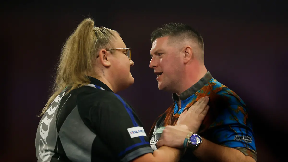 Darts-World-Darts-Championship-Alexandra-Palace-London-Britain-December-19-2025-Daryl-Gurney-and-Beau-Greaves-after-their-first-round-match-Action-Images-via-Reuters-Peter-Cziborra