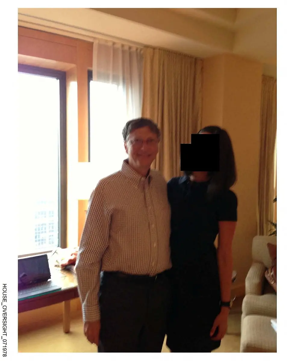 Bill-Gates-appears-with-a-woman-who-s-identity-has-been-obscured-in-this-image-from-the-Epstein-estate-released-by-House-Oversight-Committee-Democrats-in-Washington-D-C-U-S-on-December-18-2025-House-Oversight-Committee-Democrats-Handout-via-REUTERS-THIS-IMAGE-HAS-BEEN-SUPPLIED-BY-A-THIRD-PARTY-REDACTED-AREA-FROM-SOURCE