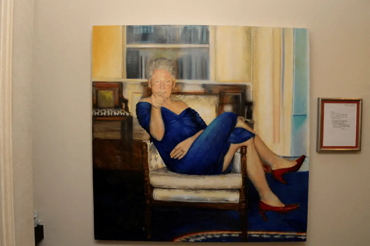 A-painting-of-former-U-S-President-Bill-Clinton-wearing-a-dress-is-displayed-inside-the-Manhattan-home-of-Jeffrey-Epstein-in-this-image-from-the-estate-of-late-financier-and-convicted-sex-offender-Jeffrey-Epstein-released-by-the-Department-of-Justice-in-Washington-D-C-U-S-on-December-19-2025-U-S-Justice-Department-Handout-via-REUTERS-THIS-IMAGE-HAS-BEEN-SUPPLIED-BY-A-THIRD-PARTY-TPX-IMAGES-OF-THE-DAY-THIS-PICTURE-WAS-PROCESSED-BY-REUTERS-TO-ENHANCE-QUALITY-AN-UNPROCESSED-VERSION-HAS-BEEN-PROVIDED-SEPARATELY