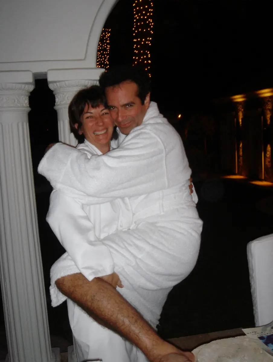 Ghislaine-Maxwell-poses-with-David-Copperfield-in-this-image-released-by-the-Department-of-Justice-in-Washington-D-C-U-S-on-December-19-2025-as-part-of-a-new-trove-of-documents-from-its-investigations-into-the-late-financier-and-convicted-sex-offender-Jeffrey-Epstein-U-S