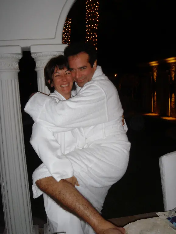 Ghislaine-Maxwell-poses-with-David-Copperfield-in-this-image-released-by-the-Department-of-Justice-in-Washington-D-C-U-S-on-December-19-2025-as-part-of-a-new-trove-of-documents-from-its-investigations-into-the-late-financier-and-convicted-sex-offender-Jeffrey-Epstein-U-S