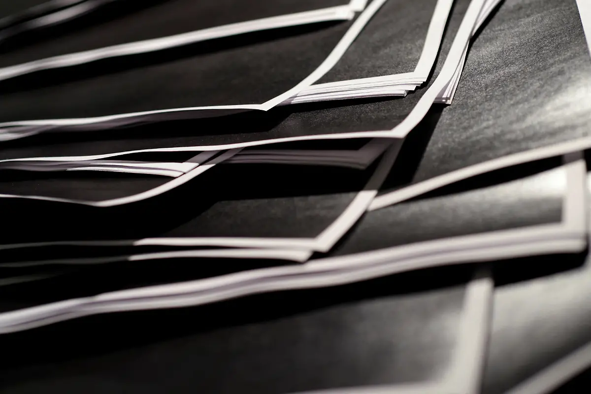 Newly-released-documents-from-disgraced-late-financier-and-sex-offender-Jeffrey-Epstein-including-a-sheaf-of-entirely-redacted-pages-are-seen-in-this-handouts-released-by-the-U-S-Justice-Department-and-printed-and-arranged-for-a-photograph-by-Reuters-in-Washington-D-C-U-S-December-19-2025