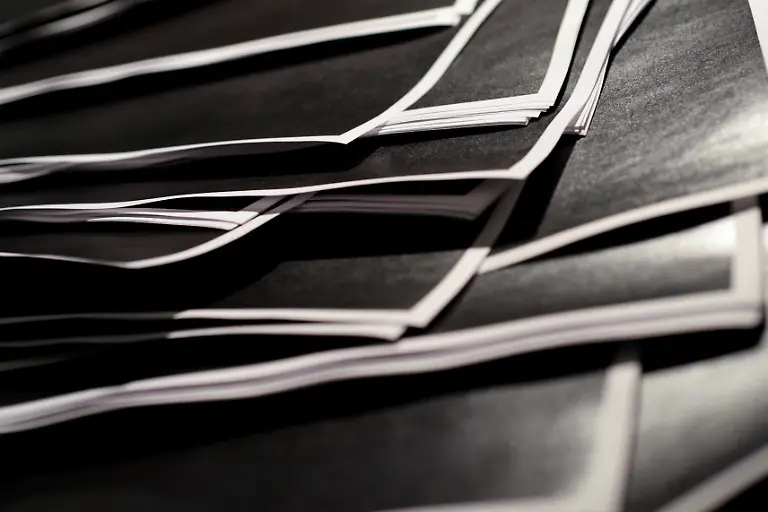 Newly-released-documents-from-disgraced-late-financier-and-sex-offender-Jeffrey-Epstein-including-a-sheaf-of-entirely-redacted-pages-are-seen-in-this-handouts-released-by-the-U-S-Justice-Department-and-printed-and-arranged-for-a-photograph-by-Reuters-in-Washington-D-C-U-S-December-19-2025