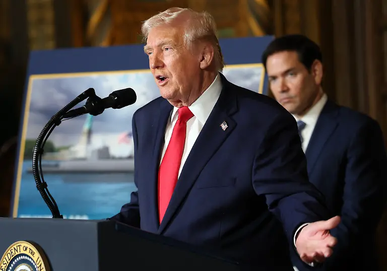 PALM-BEACH-FLORIDA-DECEMBER-22-U-S-President-Donald-Trump-joined-by-U-S-Secretary-of-State-Marco-Rubio-announces-the-creation-of-the-Trump-class-battleship-during-a-statement-to-the-media-at-Trumps-Mar-a-Lago-estate-on-December-22-2025-in-Palm-Beach-Florida-Trump-announced-the-created-of-the-new-Trump-class-battleship-which-will-become-the-centerpiece-of-the-presidents-Golden-Fleet-program-to-rebuild-and-strengthen-U-S-shipbuilding