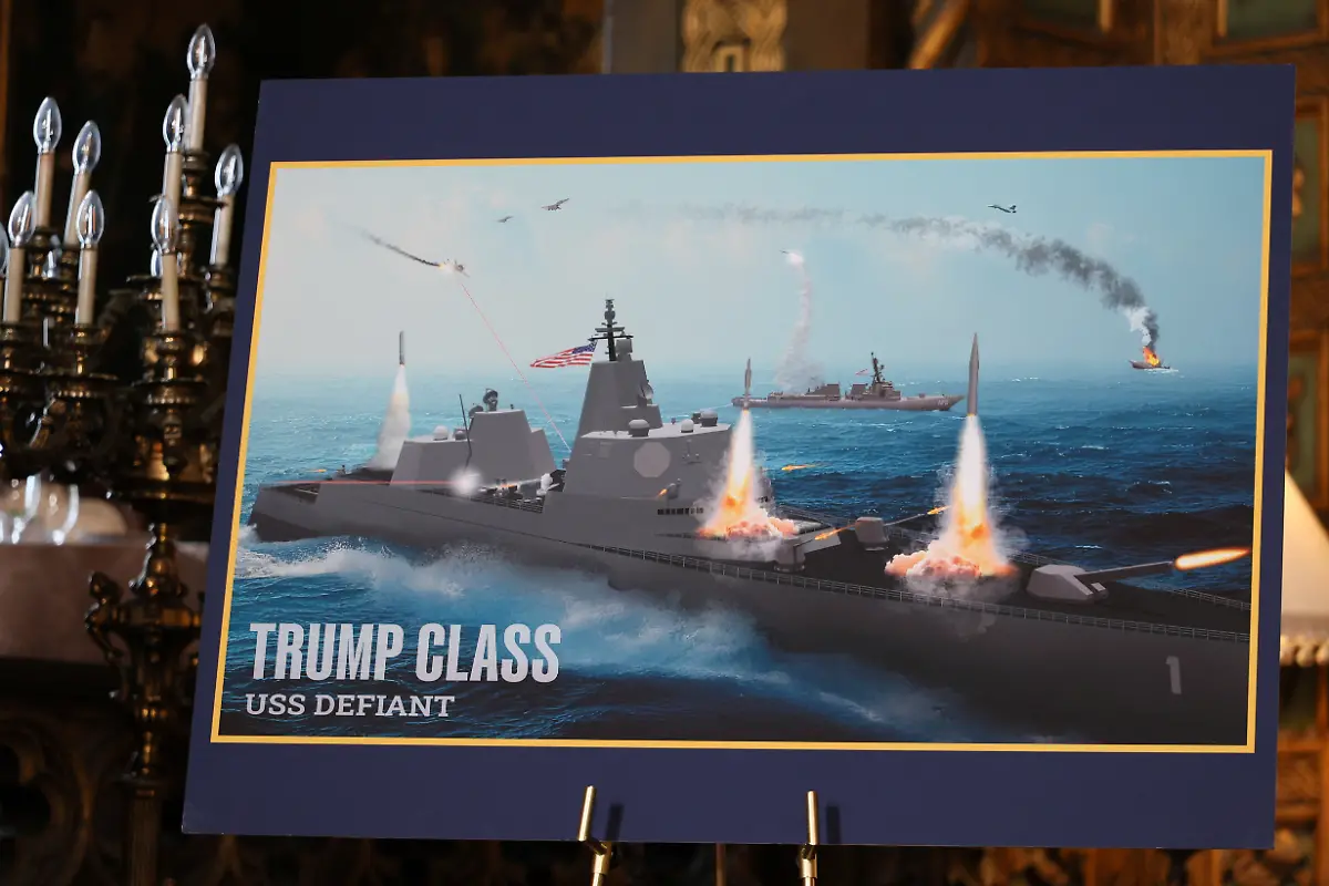 A-rendering-of-Trump-Class-USS-Defiant-is-displayed-on-the-day-U-S-President-Donald-Trump-makes-an-announcement-about-the-Navy-s-Golden-Fleet-at-Mar-a-lago-in-Palm-Beach-Florida-U-S-December-22-2025