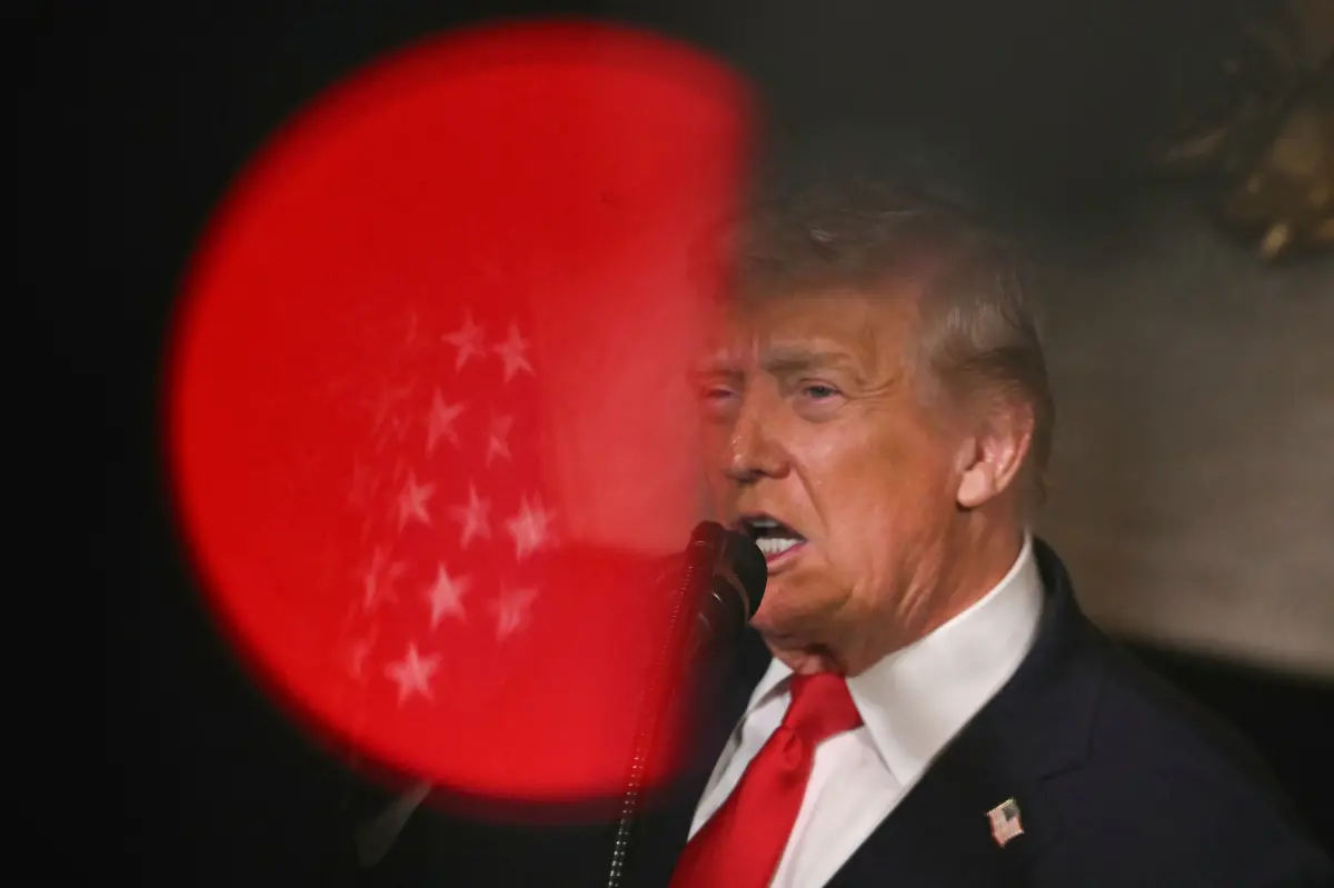 US-President-Donald-Trump-announces-the-US-Navys-new-Golden-Fleet-initiative-unveiling-a-new-class-of-warships-at-Mar-a-Lago-in-Palm-Beach-Florida-on-December-22-2025-President-Donald-Trump-on-December-22-announced-a-new-class-of-heavily-armed-warships-that-will-be-named-after-himself-an-honor-usually-reserved-for-US-leaders-who-have-left-office-Two-of-the-Trump-class-ships-will-be-built-initially-but-that-number-could-grow-substantially-in-the-future-according-to-the-president-who-said-they-will-be-some-of-the-most-lethal-surface-warfare-ships-and-the-largest-battleship-in-the-history-of-our-country-Trump-made-the-announcement-at-his-Mar-a-Lago-residence-in-Florida-alongside-Pentagon-chief-Pete-Hegseth-Secretary-of-State-Marco-Rubio-and-Navy-Secretary-John-Phelan-with-images-of-the-planned-high-tech-vessels-on-stands-nearby