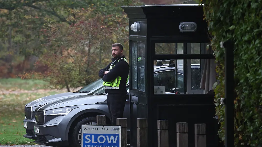 A-warden-stands-on-duty-at-the-entrance-to-the-Royal-Lodge-in-Windsor-Great-Park-in-Windsor-on-October-31-2025-King-Charles-will-strip-his-younger-brother-Andrew-of-his-royal-titles-and-long-term-residence-on-the-Windsor-estate-the-palace-said-on-October-30-2025-the-latest-fallout-to-hit-the-scandal-plagued-royal-over-the-Jeffrey-Epstein-affair-Prince-Andrew-will-now-be-known-as-Andrew-Mountbatten-Windsor-the-palace-said-adding-that-Charles-had-begun-the-formal-process-to-strip-the-titles-from-his-brother-Photo-by-HENRY-NICHOLLS-AFP-CORRECTING-DATE-The-erroneous-mention-s-appearing-in-the-metadata-of-this-photo-by-HENRY-NICHOLLS-has-been-modified-in-AFP-systems-in-the-following-manner-October-31-2025-instead-of-October-30-2025-Please-immediately-remove-the-erroneous-mention-s-from-all-your-online-services-and-delete-it-them-from-your-servers-If-you-have-been-authorized-by-AFP-to-distribute-it-them-to-third-parties-please-ensure-that-the-same-actions-are-carried-out-by-them-Failure-to-promptly-comply-with-these-instructions-will-entail-liability-on-your-part-for-any-continued-or-post-notification-usage-Therefore-we-thank-you-very-much-for-all-your-attention-and-prompt-action-We-are-sorry-for-the-inconvenience-this-notification-may-cause-and-remain-at-your-disposal-for-any-further-information-you-may-require