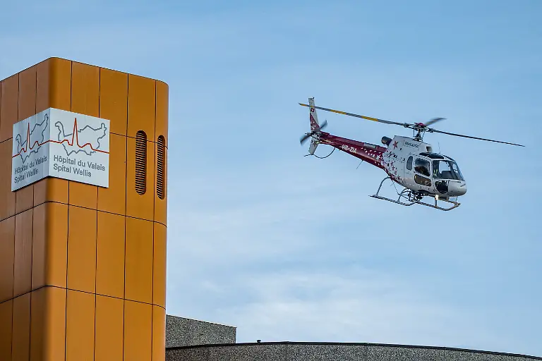 A-Swiss-Air-Ambulance-helicopter-leaves-Hospital-du-Valais-where-the-victims-are-received-following-a-fire-and-an-explosion-in-the-Le-Constellation-bar-during-a-New-Year-s-Eve-party-according-to-Swiss-police-in-the-upscale-ski-resort-of-Crans-Montana-in-southwestern-Switzerland-in-Sion-Switzerland-January-1-2026