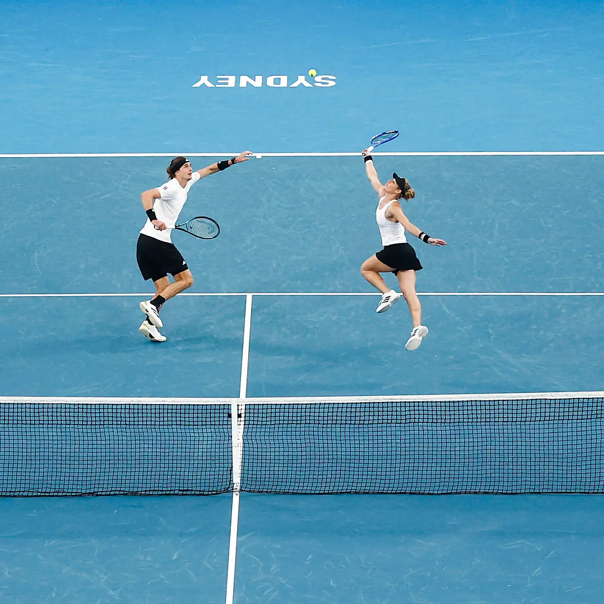 TENNIS-UNITED-CUP-SYDNEY-Alexander-Zverev-of-team-Germany-and-Laura-Siegemund-of-team-Gemany-play-a-shot-in-their-Group-F-doubles-match-against-Demi-Schuurs-of-Team-Netherlands-and-Tallon-Griekspoor-of-Team-Netherlands-during-day-three-of-the-2026-United-Cup-at-Ken-Rosewall-Arena-in-Sydney-Sunday-January-4-2026