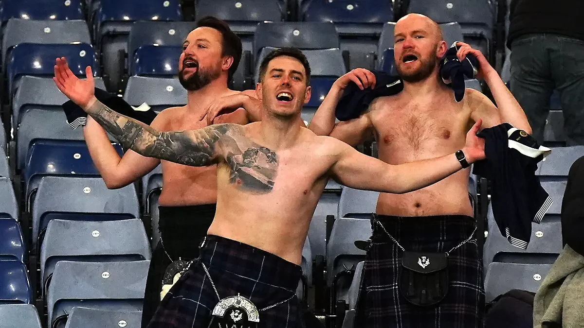 Scotland-v-Denmark-2026-FIFA-World-Cup-European-Qualifiers-Group-C-Hampden-Park-Scotland-fans-celebrate-after-they-qualified-for-the-2026-World-Cup-after-beating-Denmark-4-2-in-their-final-qualifier-at-Hampden-Park-Glasgow-Picture-date-Tuesday-November-18-2025-Photo-credit-should-read-Jane-Barlow-PA-Wire-RESTRICTIONS-Use-subject-to-restrictions-Editorial-use-only-no-commercial-use-without-prior-consent-from-rights-holder
