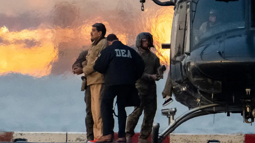 Captured-Venezuelan-President-Nicolas-Maduro-is-escorted-as-he-heads-towards-the-Daniel-Patrick-Moynihan-United-States-Courthouse-in-Manhattan-for-an-initial-appearance-to-face-U-S-federal-charges-including-narco-terrorism-conspiracy-drug-trafficking-money-laundering-and-others-at-Downtown-Manhattan-Heliport-in-New-York-City-U-S-January-5-2026