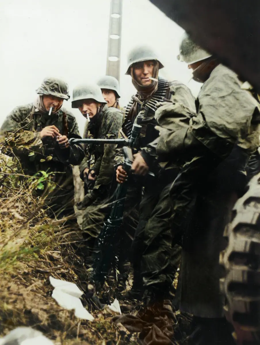 World-War-II-Battle-of-the-Bulge-Ardennes-Offensive-last-major-German-offensive-campaign-on-the-Western-Front-December-1944-January-1945-German-soldiers-smoking-looted-American-cigarettes-during-the-Battle-of-the-Bulge-Photo-December-1944