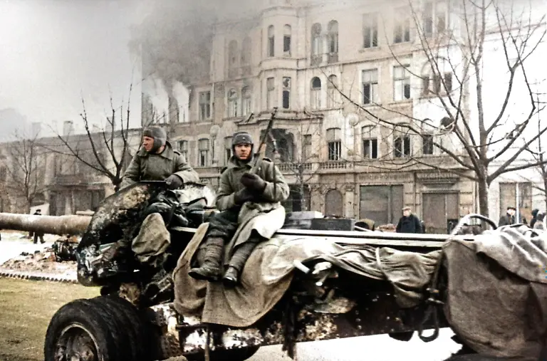 Czestochowa-Poland-Gunners-of-the-1st-Ukrainian-Front-of-the-Red-Army-stand-on-one-of-the-streets-of-the-city-liberated-from-the-Nazi-invaders-during-the-Second-World-War-AI-Colourised-from-original-ID-10540195