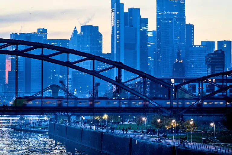 People-walk-along-the-river-Main-in-Frankfurt-Germany-on-Sunday-Nov-16-2025
