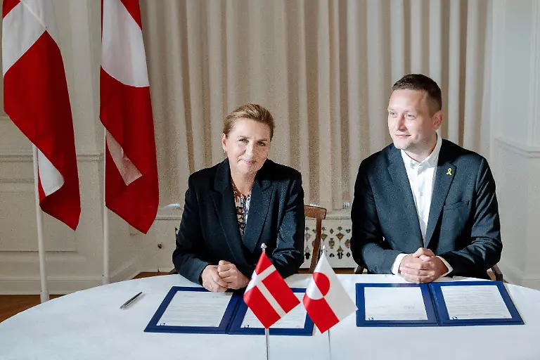 Denmark-s-Prime-Minister-Mette-Frederiksen-left-and-Greenland-s-government-leader-Jens-Frederik-Nielsen-right-attend-a-signing-ceremony-for-a-framework-agreement-for-a-self-sustaining-Greenland-at-the-Prime-Minister-s-Office-in-Copenhagen-Denmark-Tuesday-Sept-16-2025