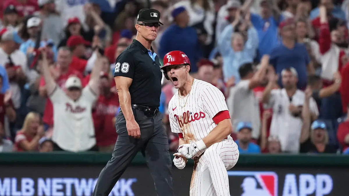 Philadelphia-Phillies-Max-Kepler-reacts-after-hitting-a-triple-during-the-eighth-inning-in-Game-2-of-baseball-s-National-League-Division-Series-against-the-Los-Angeles-Dodgers-Monday-Oct-6-2025-in-Philadelphia