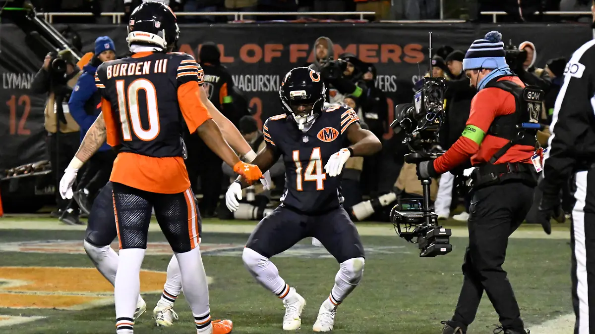 Jan-10-2026-Chicago-IL-USA-Chicago-Bears-wide-receiver-Olamide-Zaccheaus-14-reacts-with-teammates-after-a-touchdown-catch-against-the-Green-Bay-Packers-during-the-second-half-of-an-NFC-Wild-Card-Round-game-at-Soldier-Field