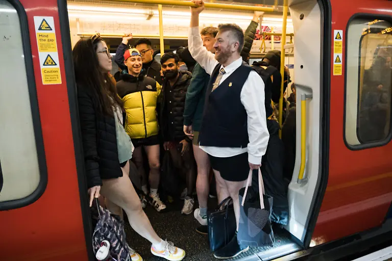Participants-are-seen-riding-the-tube-The-No-Trousers-Tube-Ride-2025-has-taken-place-in-London-this-weekend-This-annual-trouserless-tradition-was-inspired-by-No-Pants-Subway-Ride-started-in-New-York-in-2002-After-gathering-at-Chinatown-the-participants-have-travelled-through-Piccadilly-Circus-Westminster-and-and-finish-at-Waterloo-station