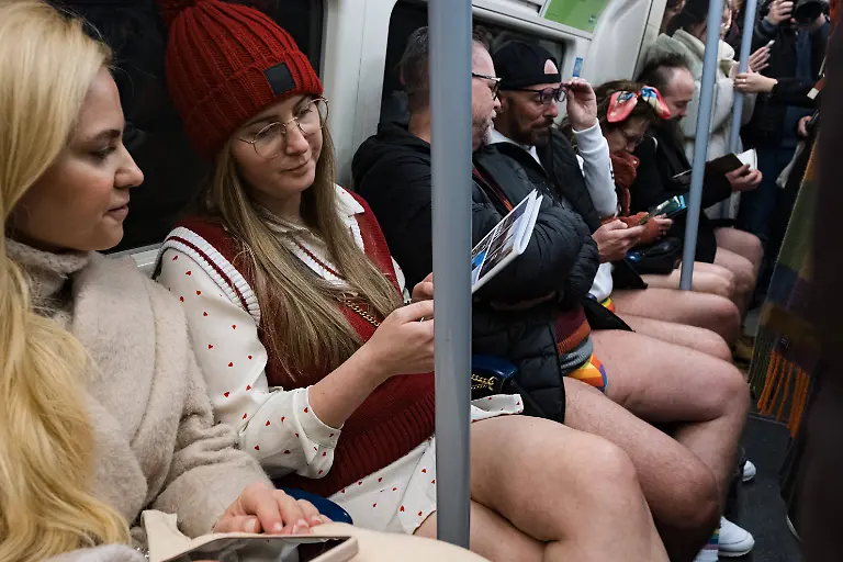 January-12-2025-London-United-Kingdom-Participants-are-seen-riding-the-tube-The-No-Trousers-Tube-Ride-2025-has-taken-place-in-London-this-weekend-This-annual-trouserless-tradition-was-inspired-by-No-Pants-Subway-Ride-started-in-New-York-in-2002-After-gathering-at-Chinatown-the-participants-have-travelled-through-Piccadilly-Circus-Westminster-and-and-finish-at-Waterloo-station