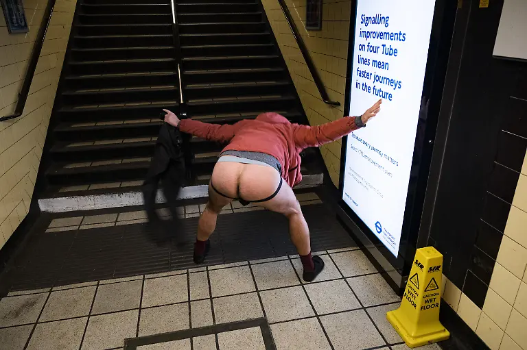 EDITORS-NOTE-Image-contains-nudity-A-participant-poses-for-a-photo-The-No-Trousers-Tube-Ride-2025-has-taken-place-in-London-this-weekend-This-annual-trouserless-tradition-was-inspired-by-No-Pants-Subway-Ride-started-in-New-York-in-2002-After-gathering-at-Chinatown-the-participants-have-travelled-through-Piccadilly-Circus-Westminster-and-and-finish-at-Waterloo-station