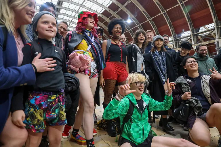 January-11-2026-London-London-UK-London-UK-Participants-take-part-in-the-15th-annual-A-a-ANo-Trousers-Tube-RideA-a-A-on-the-London-Underground-The-event-organised-by-Improv-Everywhere-is-held-each-January-and-began-in-New-York-City-before-expanding-internationally-What-started-as-a-small-prank-with-seven-participants-has-grown-into-a-global-event-with-dozens-of-cities-including-London-taking-part-each-year