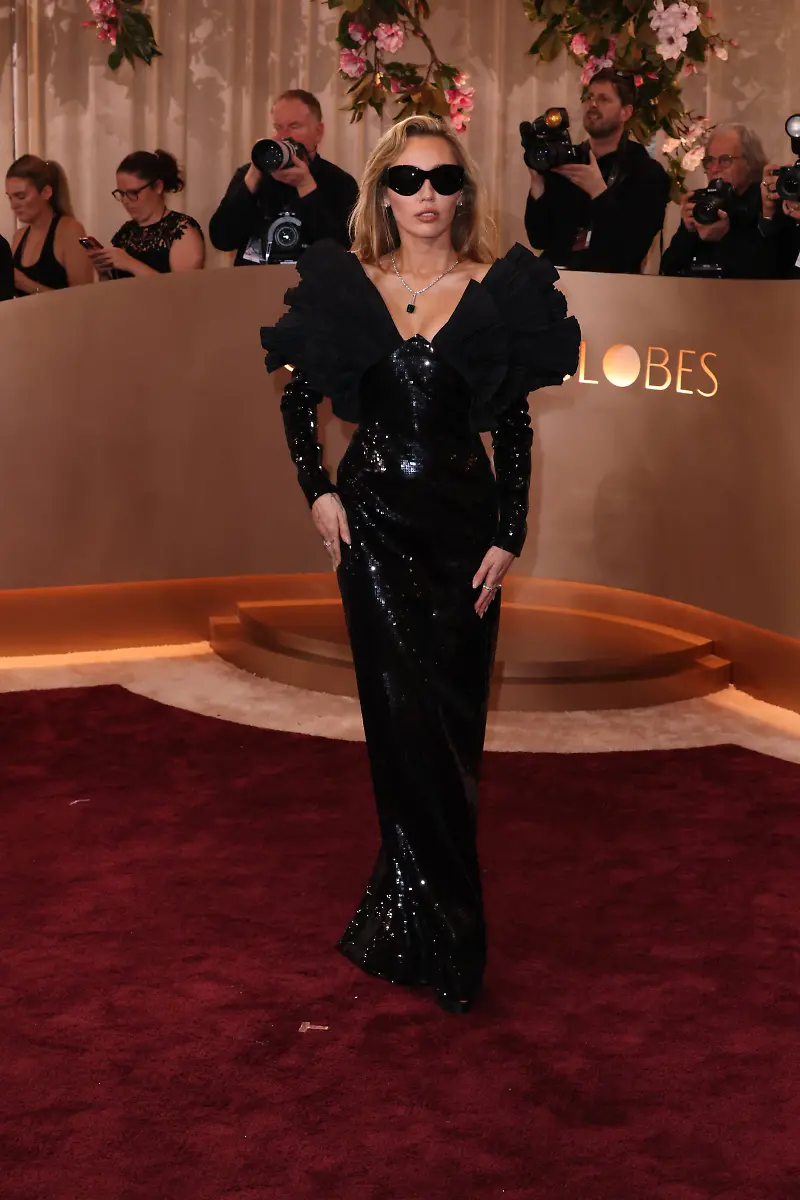83rd-Annual-Golden-Globe-Awards-Miley-Cyrus-and-guest-at-the-83rd-Annual-Golden-Globe-Awards-held-at-The-Beverly-Hilton-Hotel-on-January-11-2026-in-Beverly-Hills-Los-Angeles-California-United-States