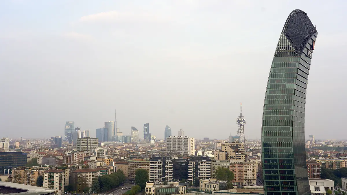 ITALY-MILAN-drone-aerial-view-of-Il-Dritto-The-Straight-One-Generali-Lo-Storto-The-Twisted-One-PwC-Il-Curvo-The-Curved-On-in-citylife-district-shopping-area