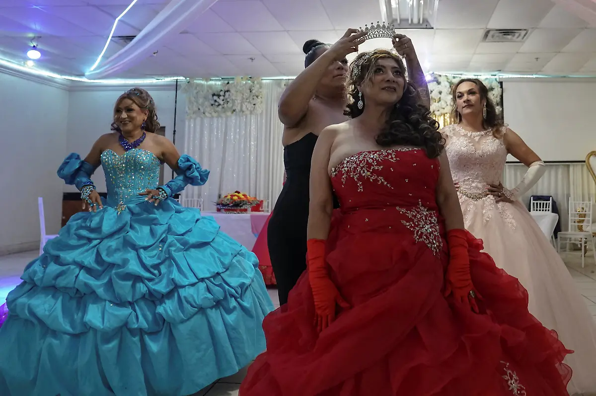 Dilian-Quijano-58-is-crowned-Princess-OLTT-Organizacion-Latina-de-Trans-en-Texas-at-a-ballroom-in-Houston-Texas-U-S-May-14-2025-Quijano-and-other-transgender-Latina-immigrants-were-recently-able-to-celebrate-this-year-as-quinceaneras-thanks-to-OLTT-a-group-promoting-rights-for-LGBTQ-people-including-transgender-women-from-Latin-America-I-would-see-them-quinceaneras-wear-beautiful-dresses-I-would-see-the-long-dress-and-them-dancing-and-I-would-say-to-myself-How-beautiful-I-would-like-to-have-a-dress-like-that-someday-but-I-never-thought-that-that-would-become-true-Quijano-said-REUTERS-Gabriel-V-Cardenas-SEARCH-CARDENAS-U-S-QUINCEANERAS-FOR-THIS-STORY-SEARCH-WIDER-IMAGE-FOR-ALL-STORIES-THIS-IMAGE-IS-ONLY-FOR-USE-WITH-THE-STORY-USA-LGBTQ-QUINCEANERAS-NO-STANDALONE-USES