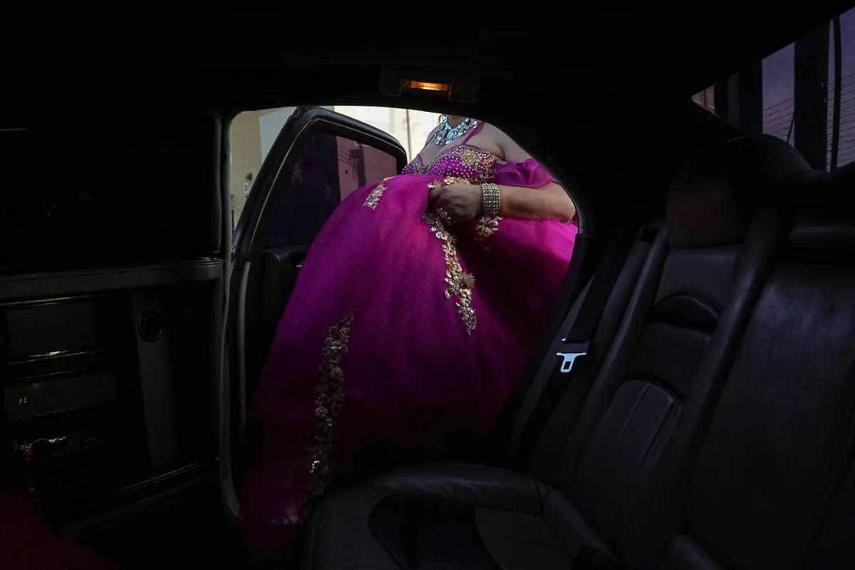 Kassandra-Rivas-51-gets-into-a-limousine-on-her-way-to-a-ballroom-in-Houston-Texas-U-S-May-14-2025-Rivas-and-other-transgender-Latina-immigrants-were-recently-able-to-celebrate-this-year-as-quinceaneras-thanks-to-the-Organizacion-Latina-de-Trans-en-Texas-a-group-promoting-rights-for-LGBTQ-people-including-transgender-women-from-Latin-America-Something-inside-me-held-a-longing-to-experience-this-moment-as-a-girl-as-a-15-year-old-Rivas-said-I-imagined-myself-standing-before-the-priest-in-church-wearing-a-dress-like-any-other-woman-REUTERS-Gabriel-V-Cardenas-SEARCH-CARDENAS-U-S-QUINCEANERAS-FOR-THIS-STORY-SEARCH-WIDER-IMAGE-FOR-ALL-STORIES-THIS-IMAGE-IS-ONLY-FOR-USE-WITH-THE-STORY-USA-LGBTQ-QUINCEANERAS-NO-STANDALONE-USES