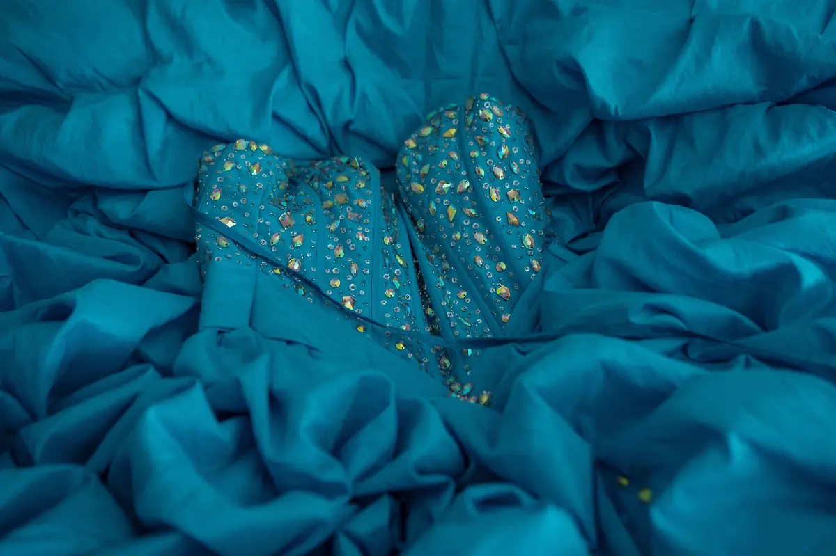 The-quinceanera-dress-of-Vickymar-Castrellon-54-at-the-hotel-where-she-is-getting-ready-in-Houston-Texas-U-S-May-14-2025-Castrellon-and-other-transgender-Latina-immigrants-were-recently-able-to-celebrate-this-year-as-quinceaneras-literally-translated-as-15-year-olds-thanks-to-the-Organizacion-Latina-de-Trans-en-Texas-a-group-promoting-rights-for-LGBTQ-people-including-transgender-women-from-Latin-America-I-never-thought-I-d-get-to-my-50s-said-Castrellon-who-would-sometimes-as-a-teenager-wear-her-friends-quinceanera-gowns-and-pretend-to-be-the-girl-of-honor-It-s-a-dream-I-ve-always-had-and-I-feel-very-happy-because-achieving-it-before-I-leave-this-world-is-something-very-beautiful-for-me-REUTERS-Gabriel-V-Cardenas-SEARCH-CARDENAS-U-S-QUINCEANERAS-FOR-THIS-STORY-SEARCH-WIDER-IMAGE-FOR-ALL-STORIES-THIS-IMAGE-IS-ONLY-FOR-USE-WITH-THE-STORY-USA-LGBTQ-QUINCEANERAS-NO-STANDALONE-USES