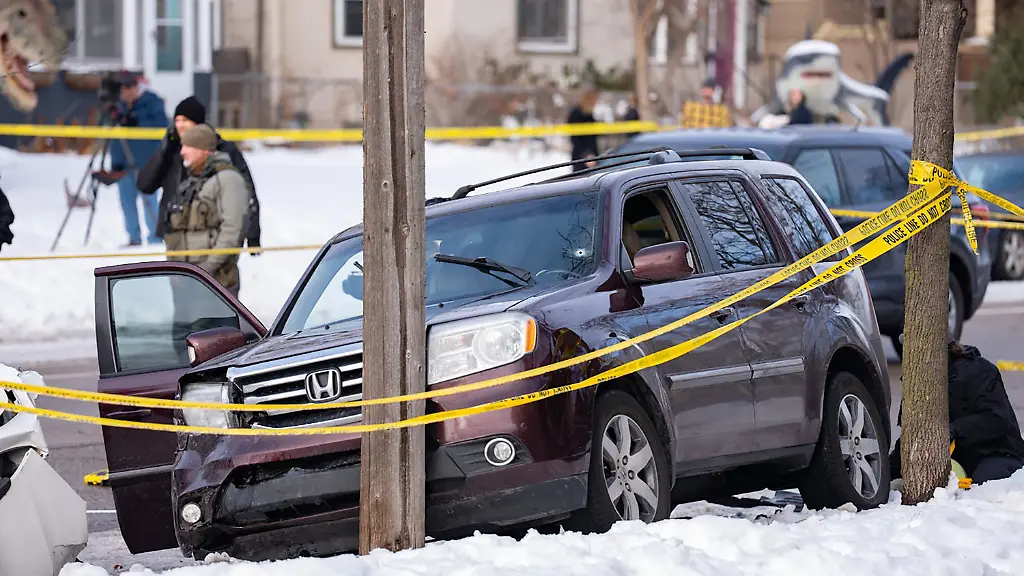 January-9-2026-A-bullet-hole-can-be-seen-in-the-windshield-of-the-SUV-Renee-Good-was-driving-when-she-was-fatally-shot-by-ICE-agent-Jonathan-Ross