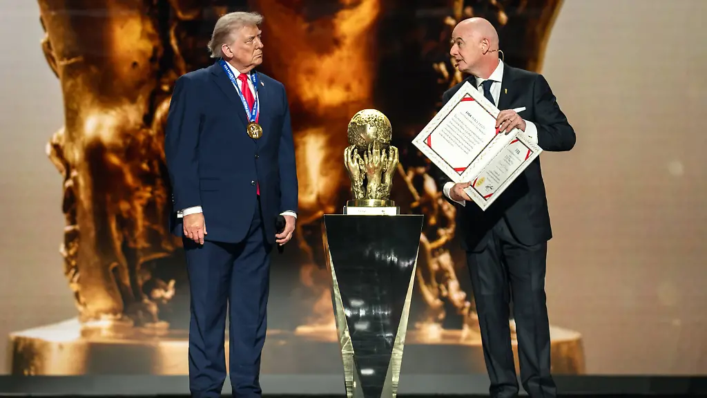 Donald-Trump-participates-in-the-FIFA-World-Cup-drawing-President-Donald-Trump-accepts-the-inaugural-FIFA-Peace-Prize-from-FIFA-President-Gianni-Infantino-Friday-December-5-2025-during-the-FIFA-World-Cup-drawing-at-the-John-F-Kennedy-Center-for-the-Performing-Arts-in-Washington-D-C