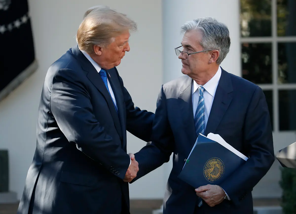 FILE-In-this-Nov-2-2017-file-photo-President-Donald-Trump-shakes-hands-with-Federal-Reserve-board-member-Jerome-Powell-after-announcing-him-as-his-nominee-for-the-next-chair-of-the-Federal-Reserve-in-the-Rose-Garden-of-the-White-House-in-Washington-Trump-has-bashed-George-W-Bush-and-the-Bush-family-hasn-t-shied-from-hitting-back-Despite-that-ill-will-the-White-House-has-found-it-advisable-to-draw-on-dozens-of-veterans-from-the-last-Republican-administration-for-their-expertise-in-running-the-government