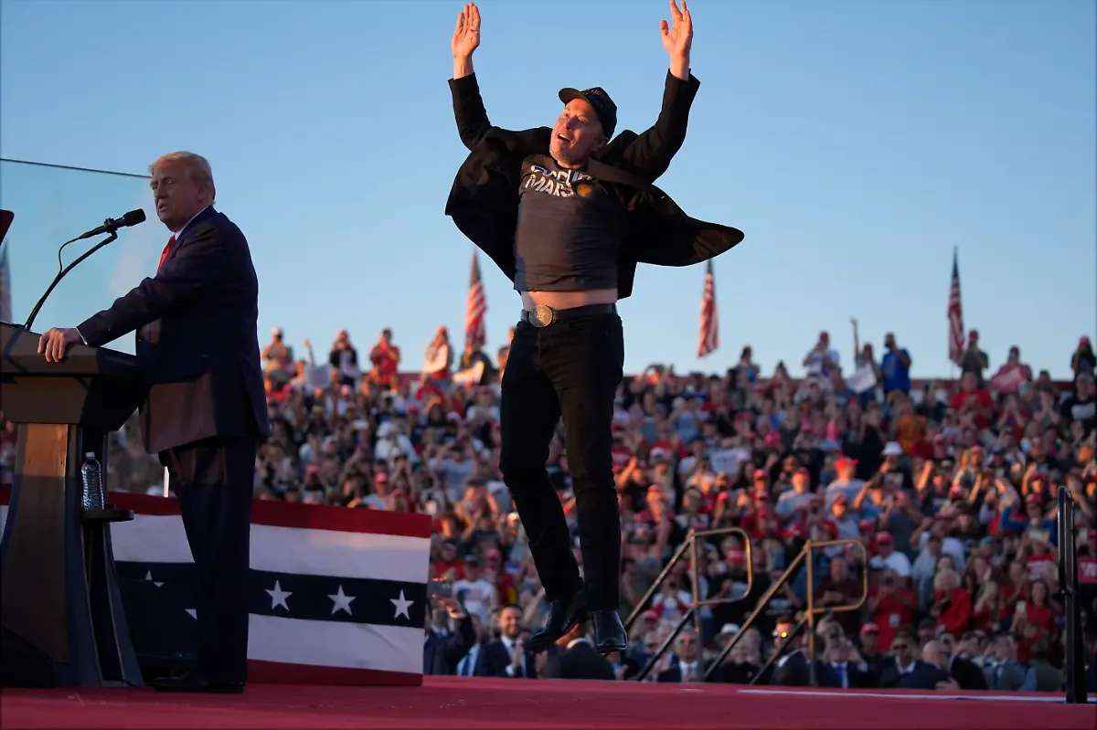 FILE-Elon-Musk-jumps-on-the-stage-as-Republican-presidential-nominee-former-President-Donald-Trump-speaks-during-a-campaign-rally-at-the-Butler-Farm-Show-on-Oct-5-2024-in-Butler-Pa