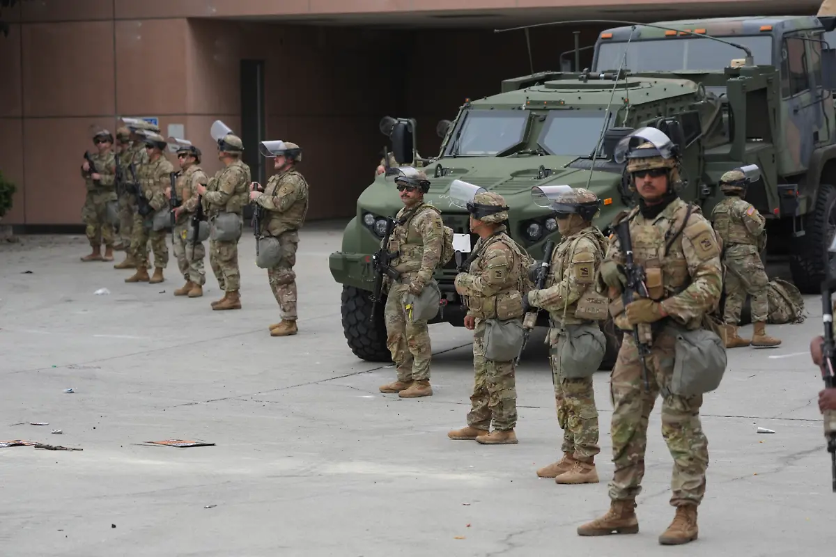 U-S-National-Guard-are-deployed-outside-the-federal-prison-in-downtown-Los-Angeles-Sunday-June-8-2025-following-a-immigration-raid-protest-the-night-before